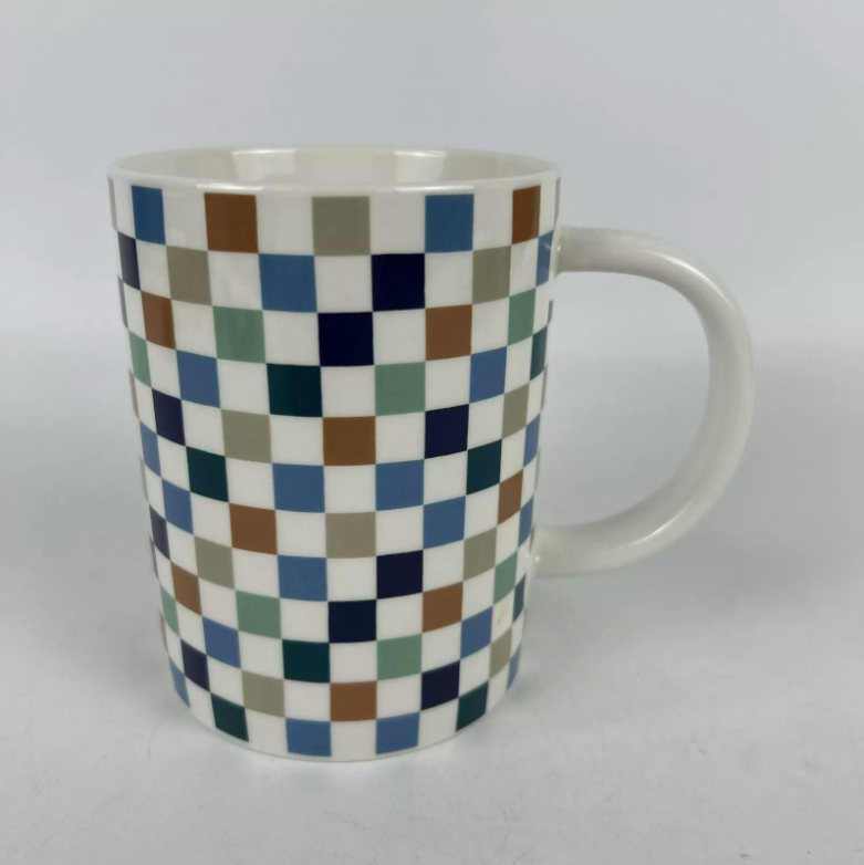 stoneware coffee mug in white checkered design